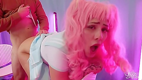 A tattooed redhead gives a blowjob to her man and then fucked