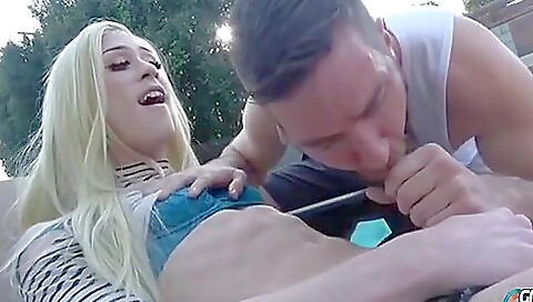 Busty blonde gets her anal fucked by a guy in a pool