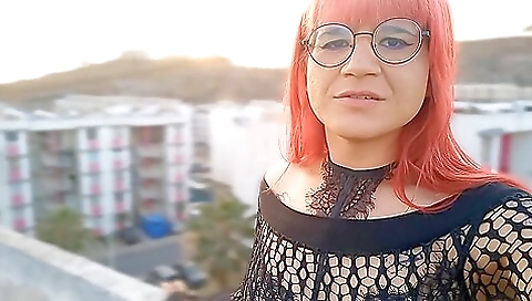 Latina with tattoos going on the roof with a dildo