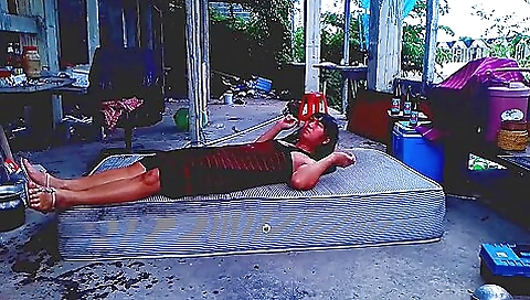 Asian teen is getting naked and riding her own device outdoors