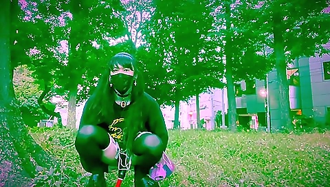 Busty brunette sucks and plays with her ass in bondage